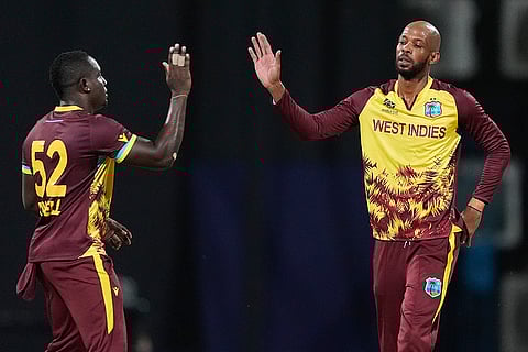 Roston Chase celebrates David Miller's wicket